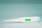 White, plastic electronic body thermometer that displays healthy body temperature. Side view. 3d rendering