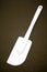 White plastic kitchen tool