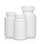 White plastic medical containers for pills isolated