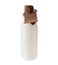 White plastic milk bottle with  a piece of rustic paper wrapped around its neck  with a string