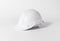 White Plastic safety helmet for engineer on gray background