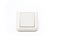 White plastic switch on white background