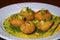 White plate decorated with Pani Puri