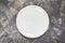 A white plate. An object. Clean. for food. View from above. For your design. Texture.