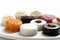 A white plate topped with assorted desserts. AI generative image