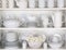 White Plates in Cupboard