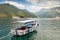 White pleasure boat floats in Kotor Bay