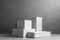 White podium for product presentation on gray background. 3d rendering. Ai Generative