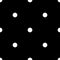 White polka dots seamless pattern on black.