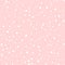 White polka dots seamless pattern on pink.