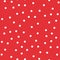 White polka dots seamless pattern on red.