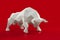 White polygonal paper bull on a red background