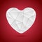 White polygonal tech heart on red background