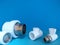 White polypropylene fittings and valve on blue background