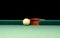 White Pool Ball on Billiard Table Near the Hole