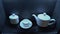 White porcelain coffee set in a cafe or in the kitchen