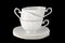 White porcelain cup with a saucer for tea or coffee, demitasse or teacup.