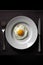 White porcelain plate. Elegant scrambled eggs