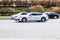 White Porsche Panamera 4S in motion. Speeding in city road concept