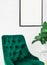 White poster green chair lamp plants