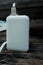 white power bank electronic with data cable on woodrn table