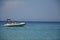 White Powerboat on Turquoise Sea