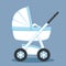 White pram on a blue background.