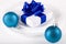 White present with blue ribbons table decoration