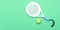 White professional paddle tennis racket and ball on mint color background. Horizontal sport theme poster, greeting cards, headers,