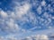 White, puffy clouds in blue sky