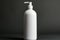 White pump bottle on a sleek gray background, minimalist elegance