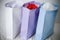 White, purple and blue paper gift shopping bags