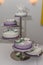 white and purple fondant wedding cake with white and purple spar