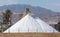 White pyramids with natural sea salt, salt works on factory near