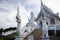 White Quan Yin or Kuan Yin chinese goddess statue and ubosot church for thai people travelers travel visit respect praying