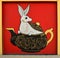 White rabbit in the teapot