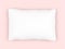 White rectangle pillow isolated on pink background.