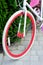 White and red bike. Stylish female red bike. standing on a sunny day outside. good pagoda for cycling
