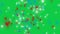 White, red, blue star particles in motion on green background