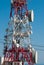 White and red metal antenna with many repeaters