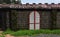 White and Red Shutters on a Chicken Coop in the Azores