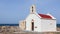 White red small church on a seashore
