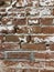 White and Red warn Brick Wall