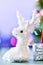 White reindeer doll for Christmas decoration on bokeh light
