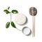 White rice, chopsticks and a branch of a young plant on a white