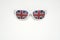 White rimmed sunglasses with UK flag on a white isolated background. Free space for your text.