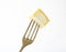 White rind cheese on fork