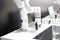 White robotic arm manipulator on gray background