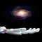 White robotic hand presents galaxy space. 3d rendering