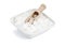 White rock candy in square bowl with wooden shovel